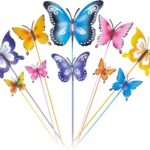 A set of 10 colorful metal butterfly garden stakes with intricate details, standing in a lush green garden bed.