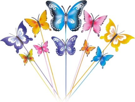 A set of 10 colorful metal butterfly garden stakes with intricate details, standing in a lush green garden bed.