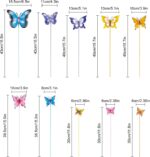 A set of 10 colorful metal butterfly garden stakes with intricate details, standing in a lush green garden bed.