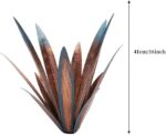 Two colorful Jesokiibo metal agave sculptures, 12 and 16 inches tall, displayed in a vibrant garden setting.