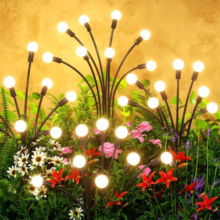 Four black solar lights with large, glowing LED bulbs swaying gently in a garden at dusk, resembling fireflies.