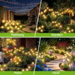 Four black solar lights with large, glowing LED bulbs swaying gently in a garden at dusk, resembling fireflies.