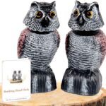 Two WonderField 8.3-inch brown bobblehead owl decoys with yellow eyes, positioned outdoors in a garden setting.